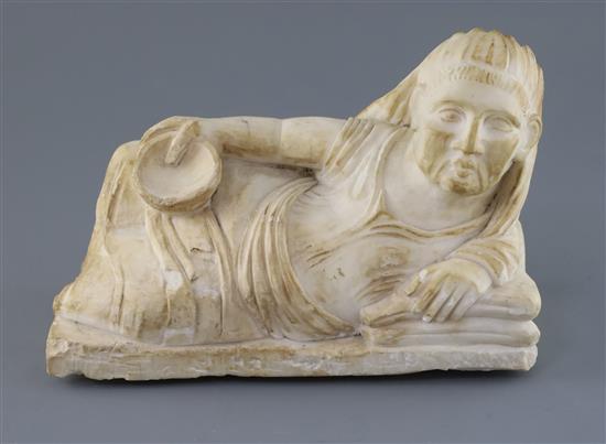 An alabaster cinerary urn cover, probably Etruscan 3rd-2nd century B.C., L. 26cm, H. 17cm